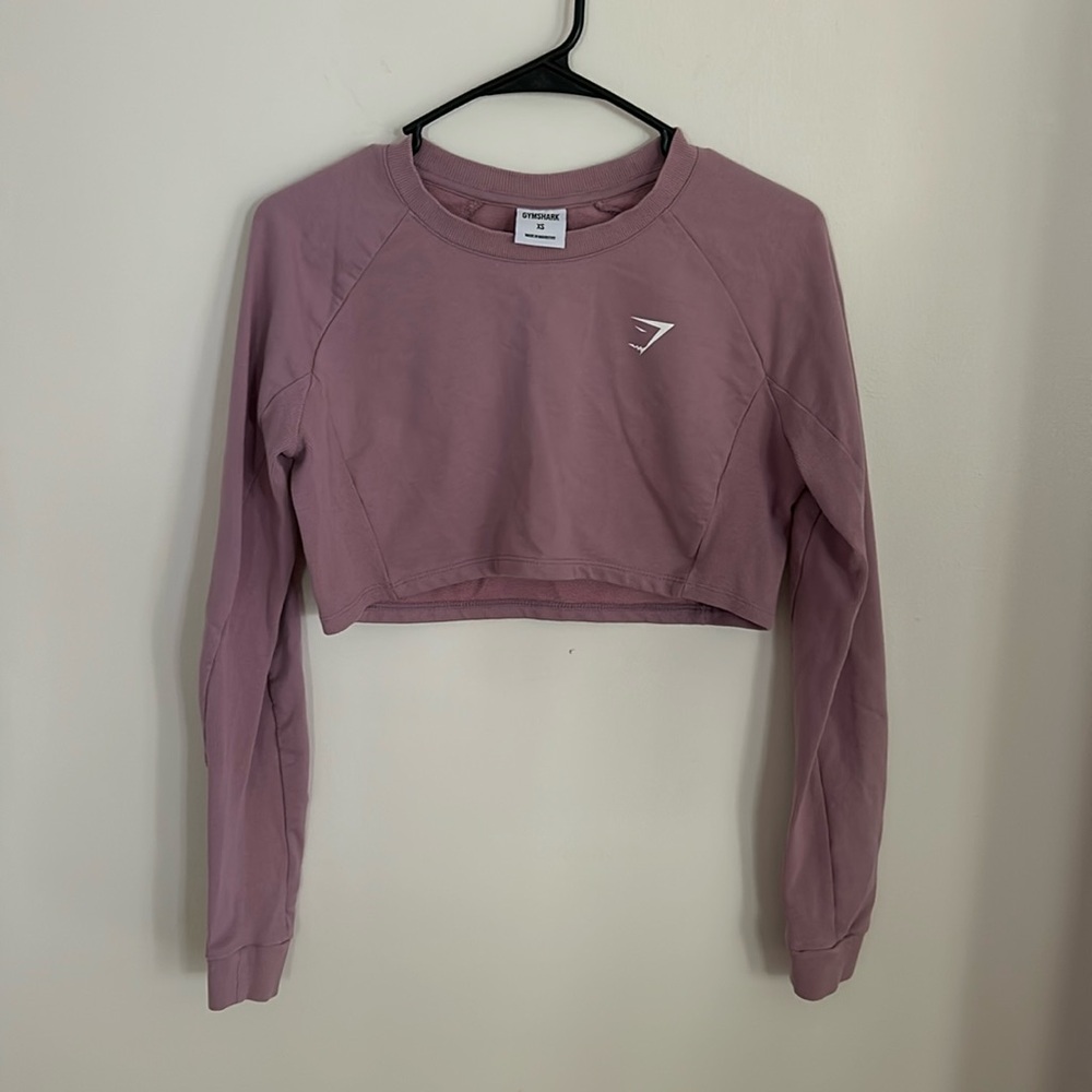 Women’s light pink long sleeve Gym Shark workout top. Size XS